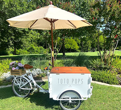 Beautiful nostalgic trike catering frozen paleta popsicles made with fresh fruit, popular dessert treat in Dallas-Fort Worth for summer catering and events